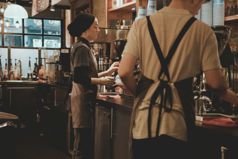 Baristas at work in a cozy cafe
