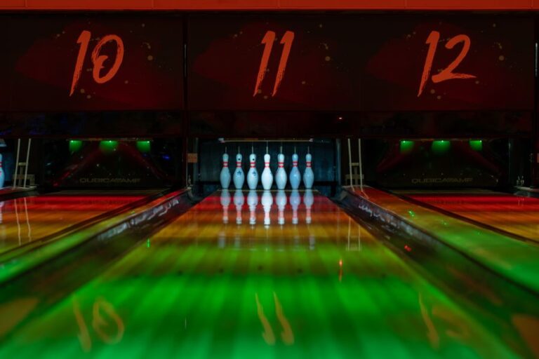 Colorful bowling alley lanes with pins set up
