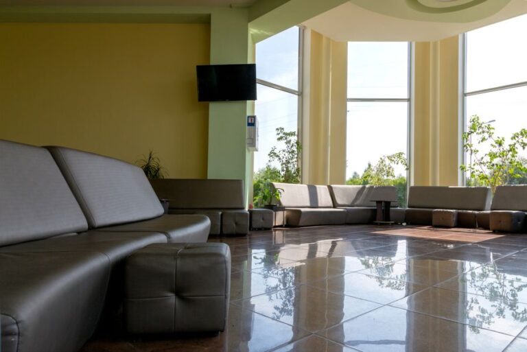Bright modern lobby with seating and large windows